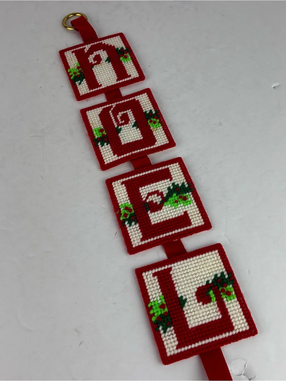 Hand Crafted Vintage Plastic & Yarn Hooked Santa & Noel Wall Hangings Set of 2